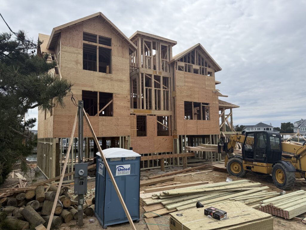 Over 3,000 sf On the Bay Will have a beautiful new dock Pool, Outdoor Kitchen Cabana, Outdoor Shower Elevator Five Bedrooms Four Bathrooms; Powder Room Open Roof Deck
