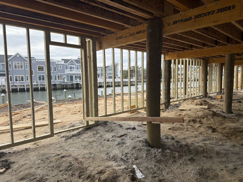 Over 3,000 sf On the Bay Will have a beautiful new dock Pool, Outdoor Kitchen Cabana, Outdoor Shower Elevator Five Bedrooms Four Bathrooms; Powder Room Open Roof Deck