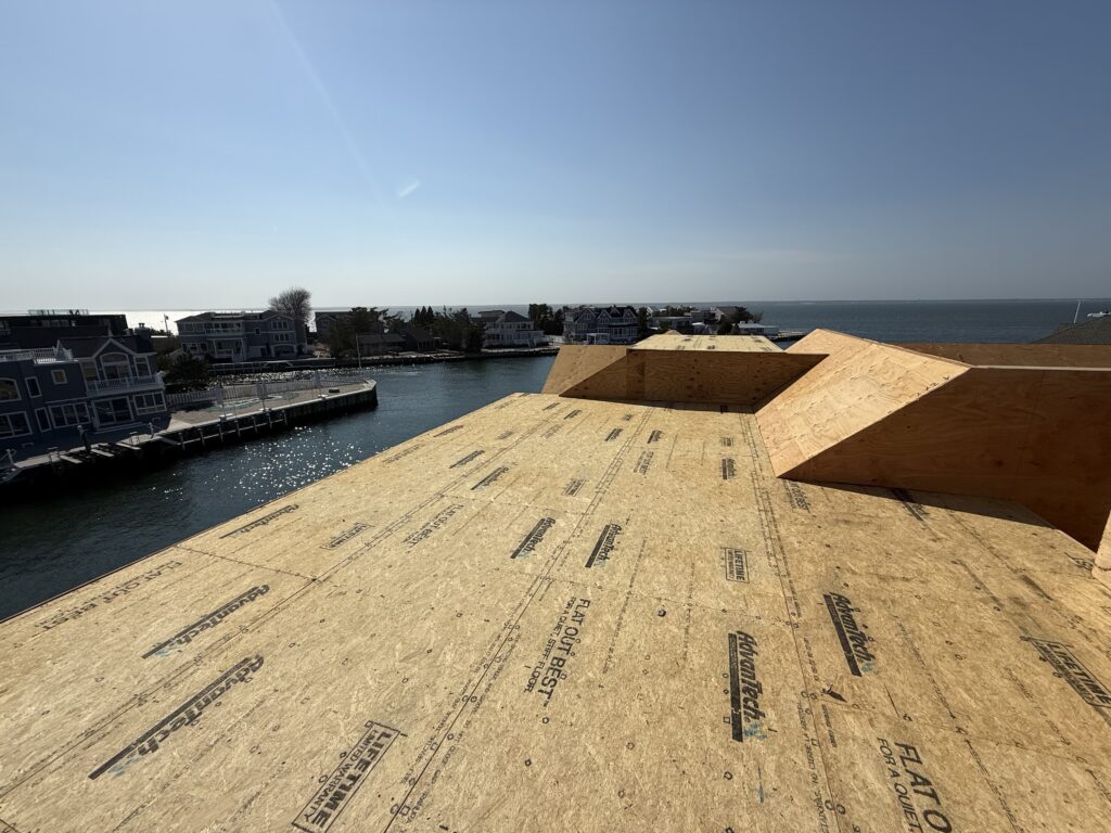 Over 3,000 sf On the Bay Will have a beautiful new dock Pool, Outdoor Kitchen Cabana, Outdoor Shower Elevator Five Bedrooms Four Bathrooms; Powder Room Open Roof Deck