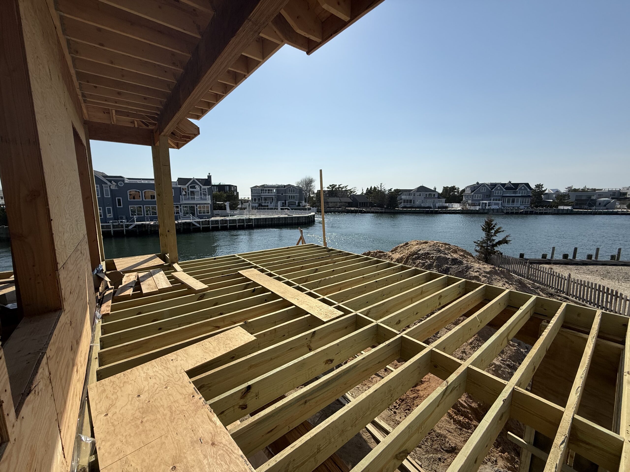 Over 3,000 sf On the Bay Will have a beautiful new dock Pool, Outdoor Kitchen Cabana, Outdoor Shower Elevator Five Bedrooms Four Bathrooms; Powder Room Open Roof Deck